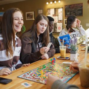 Students Playing a Board Game