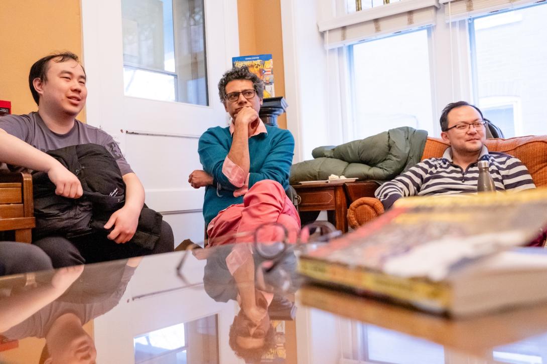 Faculty ponder questions about sci-fi stories in the living room of the Humanities Center